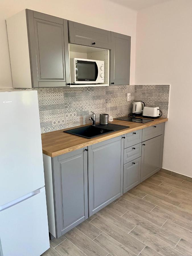 Pacsirta Apartman Grand Еґер Екстер'єр фото